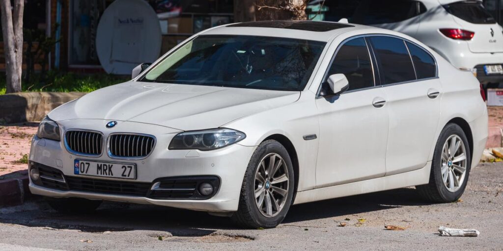 White BMW 5 Series Luxury Sedan.